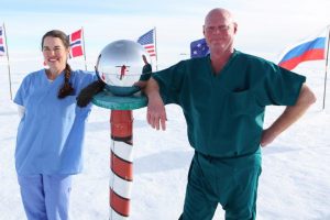 PA Cassie Spruill and Sean Roden, MD, at the ceremonial South Pole in 2013
